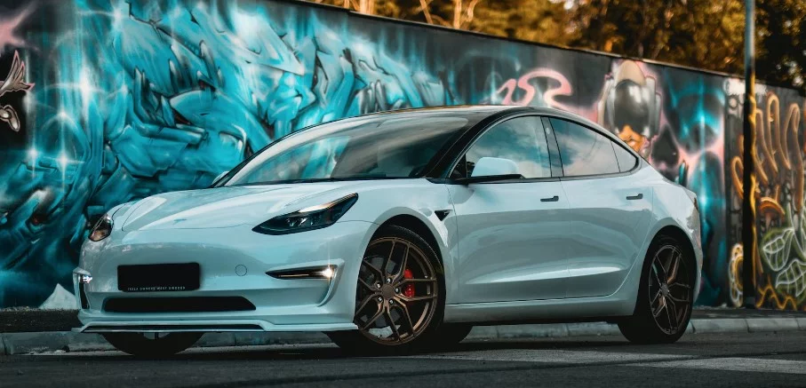 Tesla on side of the road
